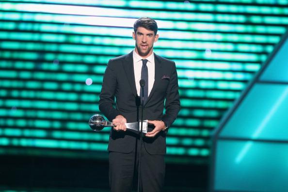 USA swimmer Michael Phelps accepts award for Best Record-Breaking Performance onstage at The 2013 ESPY Awards at Nokia Theatre L.A. Live on July 17, 2013 in Los Angeles, California. (Photo by Frederick M. Brown/Getty Images for ESPY)