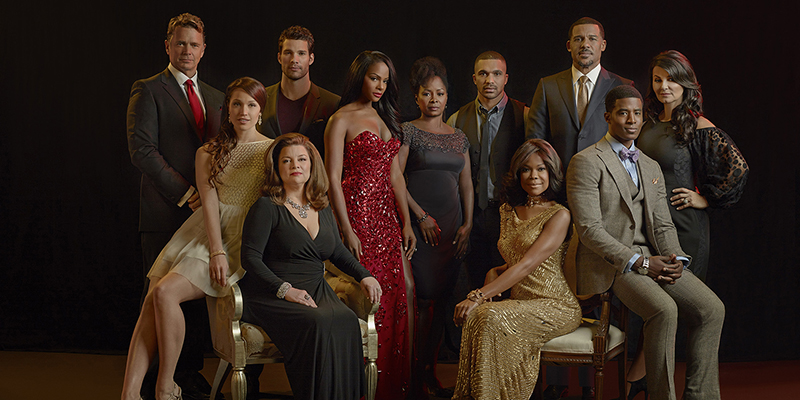 Cast photo of "The Haves and the Have Nots" (New Season) Left to right: John Schneider, Jaclyn Betham (in yellow), Renee Lawless (in black), Aaron O'Connell, Tika Sumpter, Crystal Fox, Tyler Lepley, Angela Robinson (in gold), Peter Parros (in charcoal grey); Gavin Houston (with bow tie) and Eva Tamargo; Photo Credit: Jeremy Cowart/OWN