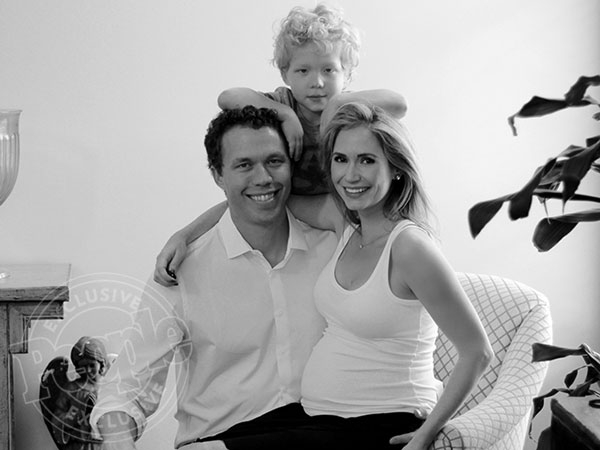 Pictured: Ashley Jones, husband Joel & stepson Huck