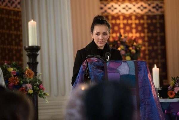 Cleo struggles through Celine's funeral.
